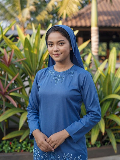 Nurhaida, 24-year-old Bruneian woman from Tutong representing traditional Islamic values and family-oriented Bruneian culture